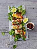 Asian rice paper rolls with duck, mango and herbs