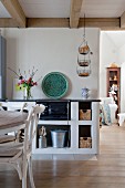 Traditional stove in open-plan country-house kitchen