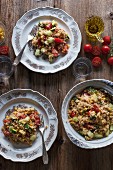 Vegetarian couscous with tomatoes, zucchini, corn and cucumbers served for lunch