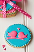 Lovebird cookies tied with a ribbon