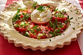 Tomato with mozzarella and herbs