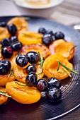 Roasted apricots and blueberries with rosemary