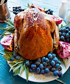Roast turkey with grapes, pomegranate and sage