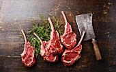 Raw fresh meat Veal ribs and Meat cleaver on wooden background