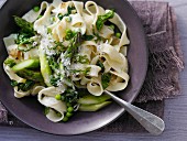 Tagliatelle with spinach, green asparagus, peas and Parmesan