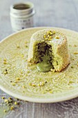 A lava cake with pistachio cream