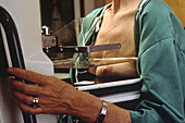 Woman getting mammogram