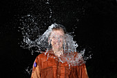Water Balloon Popped Above Man's Head