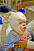 Child With Spinal Bifida & EEG Cap