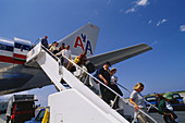 Passengers Disembarking Plane