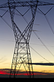 Electric Transmission Tower and Sunset