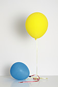 Balloons filled with helium and air