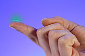 Contact lens on a fingertip