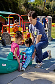 Helping Disabled Children at Playground