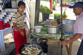Street Food Vendor Selling Egg rolls