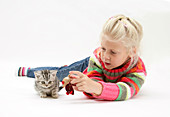 Young Girl with Silver Tabby Kitten