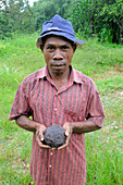 Man with Rafflesia Bud