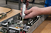 Technician Assembling Server for Computer