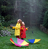 Sisters Playing in the Rain
