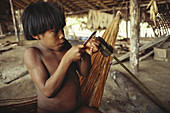 Yanomami Indian Making Arrow,Brazil