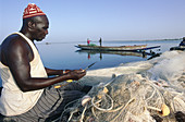 Fisherman Mending Fishing Nets,Senegal