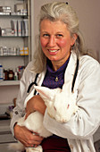 Veterinarian with a White Rabbit