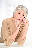 Older woman using mobile phone
