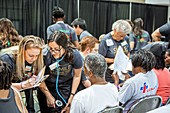 Patients at a free dental clinic