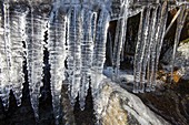 Icicles over a stream