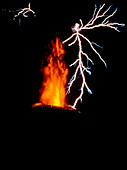 Lightning striking erupting Talbachic Volcano