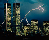 Lightning bolts striking behind skyscrapers