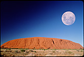 View of Ayers Rock,Australia,with full moon