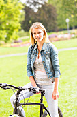 Woman sitting on a bicycle