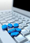 Blue pills on computer,illustration
