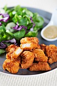 Fried chicken with salad