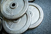 Close-up of weight plates in stack