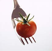 Cherry tomato on a fork