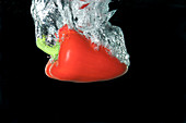 Red Pepper falling into water