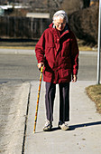 Elderly Woman with Cane