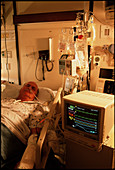 Male cardiac patient in intensive care unit