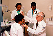 Tinnitus clinic: doctor evaluating patient