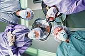 Patient's eye view of a surgical team