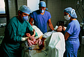 Baby being born in hospital