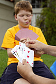 Boys playing cards