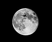 Jet Crossing in Front of the Moon