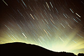 Equatorial star trails with cirrus clouds