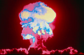 Coloured image of an atomic bomb explosion