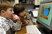 Children Playing a Game on a Computer