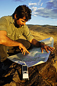 Geologist with global positioning receiver