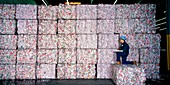Stacks of crushed aluminium cans for recycling